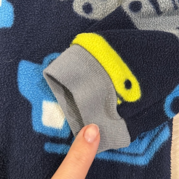 Long sleeved, footed, fleece pyjamas for boy. Construction vehicle print. - Picture 2 of 4